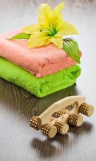 Flower on towels with massager