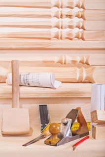 Woodworking tools on steps of wooden loader