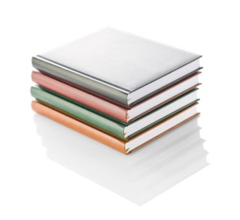Stack of four diaries isolated