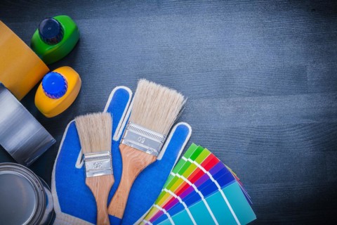 Set of painting objects on wooden board construction concept