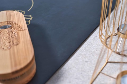 Image of a box with nails in a light studio on a black mat. Yoga concept. Spiritual practices. Mixed media