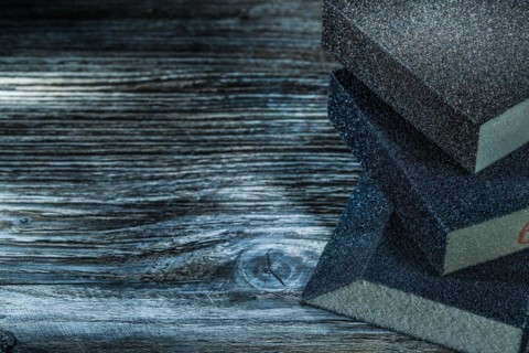 Abrasive blocks on vintage wooden board top view
