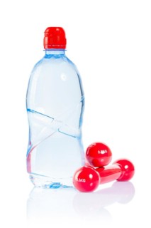 Bottle and dumbbells