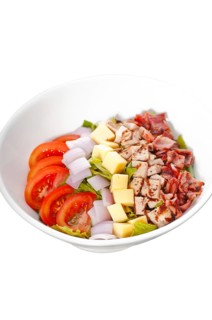 Fresh classic caesar salad over white background