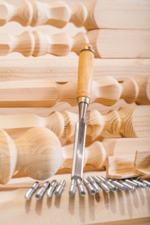 Carpenter's chisel and wooden figure