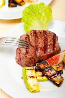 Grilled fresh beef filet mignon and vegetables