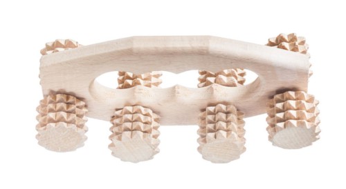 Big wooden massager isolated on white