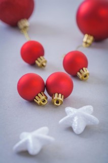 Red Christmas baubles and white stars