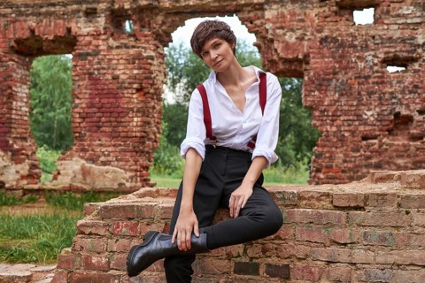 Image of a stylish beautiful woman in a white shirt