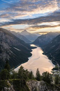 View of the Plansee lake from Schoenjoechl at sunset