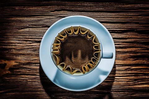 Coffee in white cup with filter