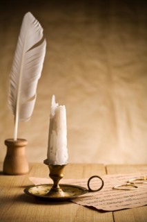 Unlit candle on vintage table