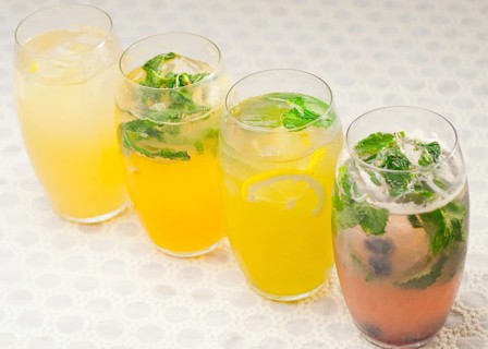 Selection of fresh fruits colorful long drink cocktails