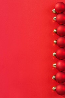 Copyspace image series of small red Christmas baubles