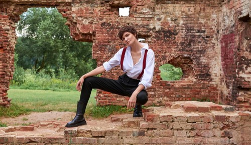 Image of a stylish beautiful woman in a white shirt