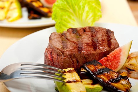 Grilled fresh beef filet mignon and vegetables