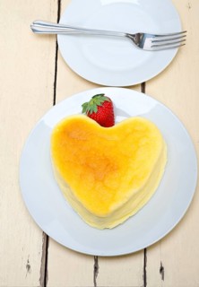 Heart shaped cheesecake with strawberryes ideal cake for valentine day