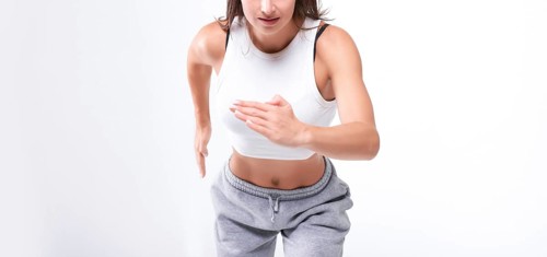 No name portrait. Sports woman runner on a white background. Photo of an attractive woman in fashionable sportswear. Dynamic movement. Side view. Sports and healthy lifestyle. Mixed media