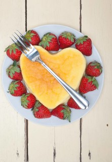 Heart shaped cheesecake with strawberryes ideal cake for valentine day