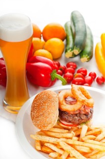 Classic american hamburger sandwich with onion rings and french fries