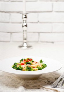 Classic Italian penne pasta with broccoli and red chili pepper
