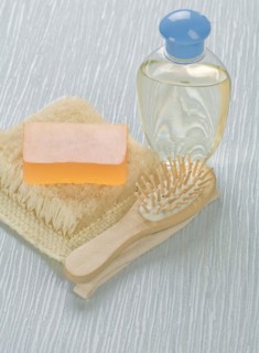 Bottle of hairbrush Soap and raffia