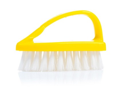 A yellow kitchen scrubber against a white background