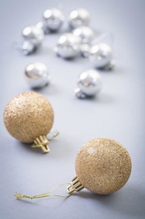 Christmas baubles on grey background