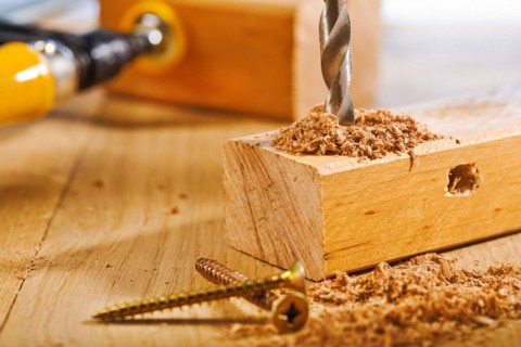 Drilling wooden panels
