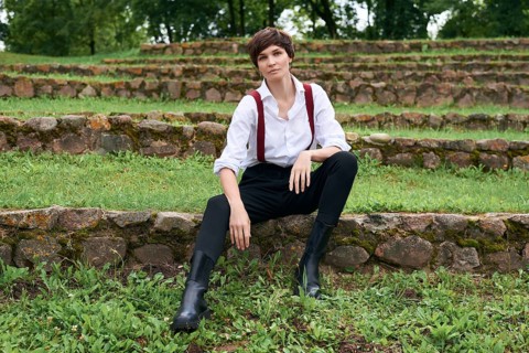 Image of a stylish beautiful woman in a white shirt