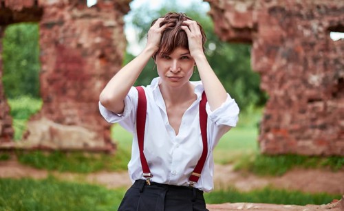 Image of a stylish beautiful woman in a white shirt