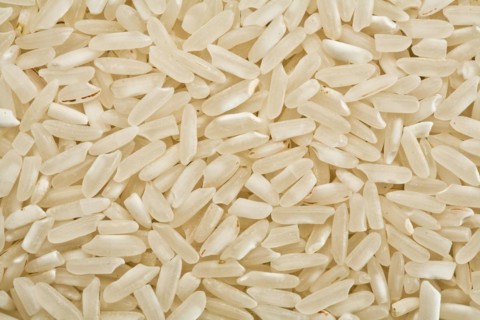 White raw rice background