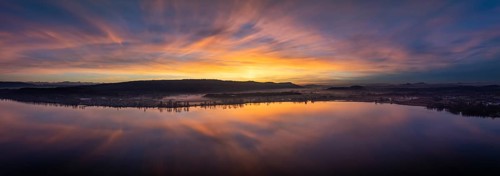Aerial panorama of an atmospheric sunset over the Untersee