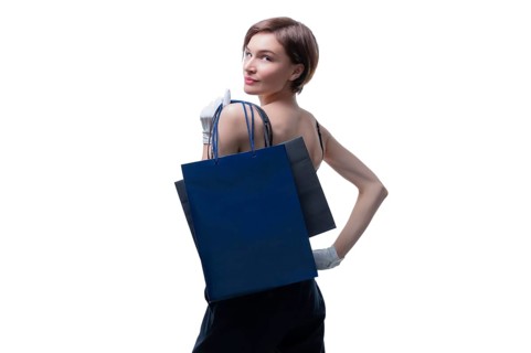 Beautiful young woman in white gloves threw a black craft bag over her shoulder. Shopaholics concept. Spenting. Gifts for the holidays. Black Friday. Shopping centers