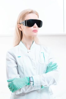 Portrait of a girl in black glasses for laser hair removal. Concept of cosmetology