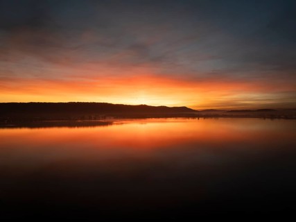 Aerial view of an atmospheric sunset over the Untersee