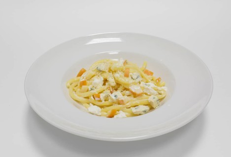 Gourmet pasta with different types of cheese. Blue cheeses. Top view.