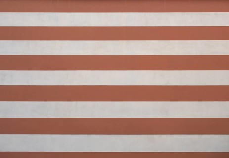 Striped brown and white plaster texture background