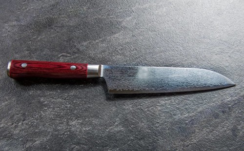 Excellent Japanese chef's knife from Damascus steel. View from above