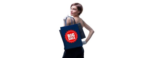Beautiful young woman in white gloves threw a black craft bag over her shoulder. Shopaholics concept. Spenting. Gifts for the holidays. Black Friday. Shopping centers