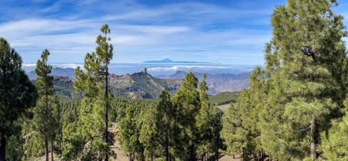 View of Roque Nublo and the Teide mountain peak on the neighbouring island of Tenerife