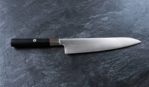 Chef's knife from Damascus steel. A real Japanese work of art. View from above