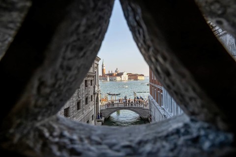 View from the Bridge of Sighs through a small hatch