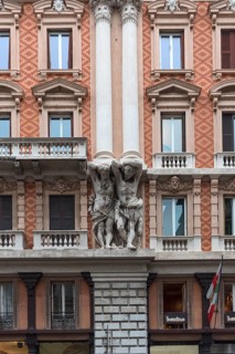 Atlases on a historic house facade