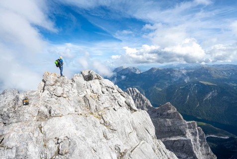 Mountaineer on a narrow rocky ridge