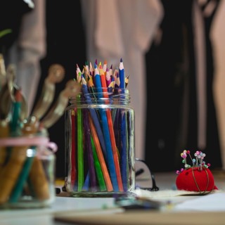 Desk of a fashion designer background concept