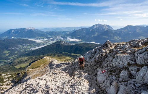 Mountaineer on hiking trail to Watzmann Hocheck summit