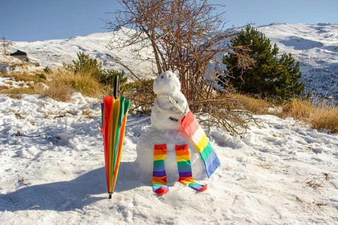 Snowman decorated with umbrella