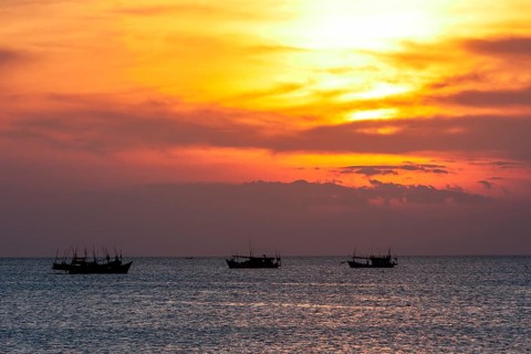 Sunset and fishing boats