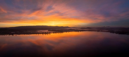 Aerial panorama of an atmospheric sunset over the Untersee